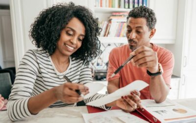 older couple looking over tax documents and paper work