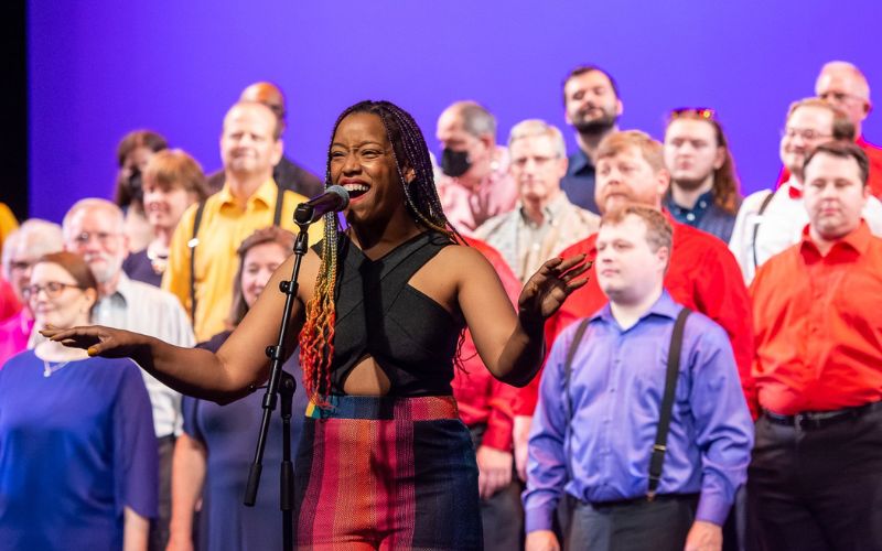 Dr. Shumake singing at a public performance