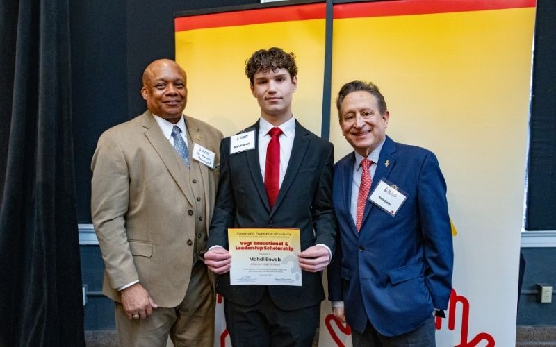 Photo featuring JCPS Superintendent Brian Yearwood, Ph.D., Vogt Scholar, Vogt Scholar Mahdi Bevab, and Community Foundation CEO & President, Ron Gallo