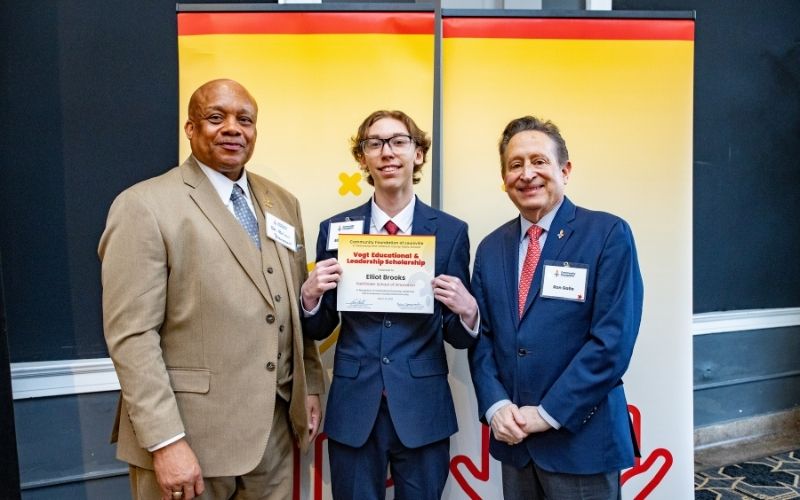 Photo featuring JCPS Superintendent Brian Yearwood, Ph.D., Vogt Scholar, Vogt Scholar Elliot Brooks, and Community Foundation CEO & President, Ron Gallo