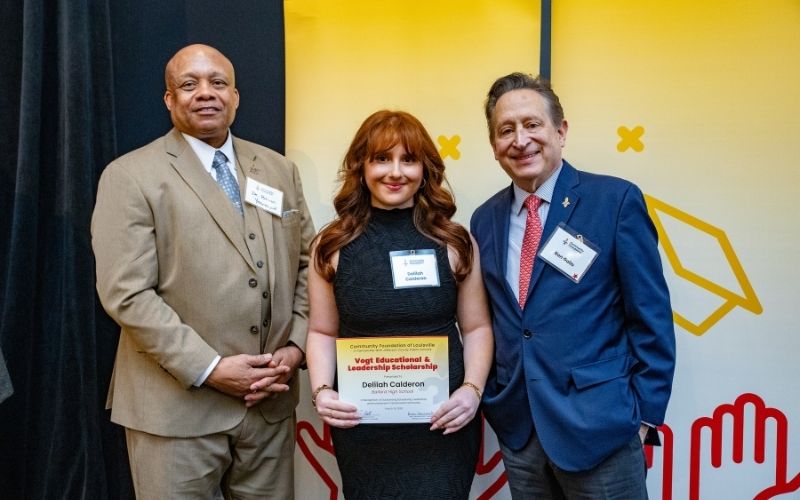 Photo featuring JCPS Superintendent Brian Yearwood, Ph.D., Vogt Scholar, Vogt Scholar Delilah Calderon, and Community Foundation CEO & President, Ron Gallo