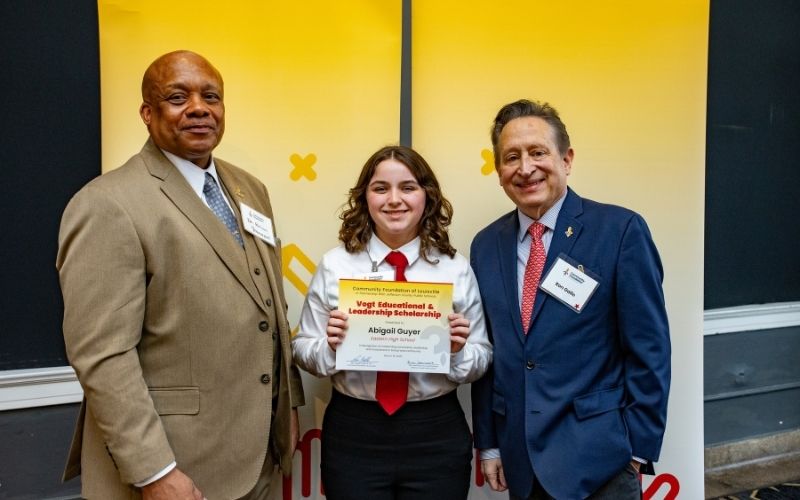 Photo featuring JCPS Superintendent Brian Yearwood, Ph.D., Vogt Scholar, Vogt Scholar Abigail Guyer, and Community Foundation CEO & President, Ron Gallo