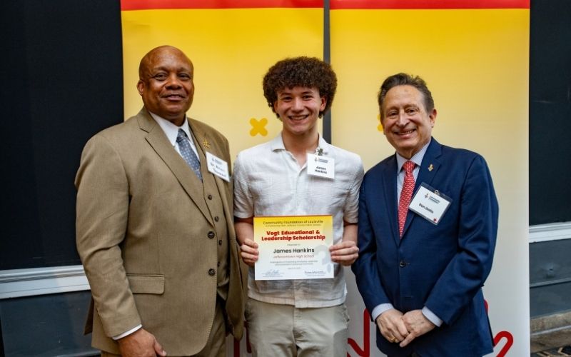 Photo featuring JCPS Superintendent Brian Yearwood, Ph.D., Vogt Scholar, Vogt Scholar James Hankins, and Community Foundation CEO & President, Ron Gallo