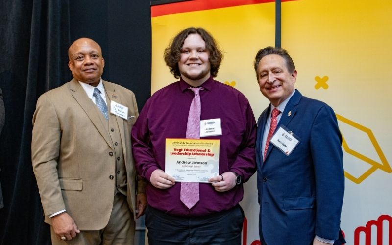 Photo featuring JCPS Superintendent Brian Yearwood, Ph.D., Vogt Scholar, Vogt Scholar Andrew Johnson, and Community Foundation CEO & President, Ron Gallo