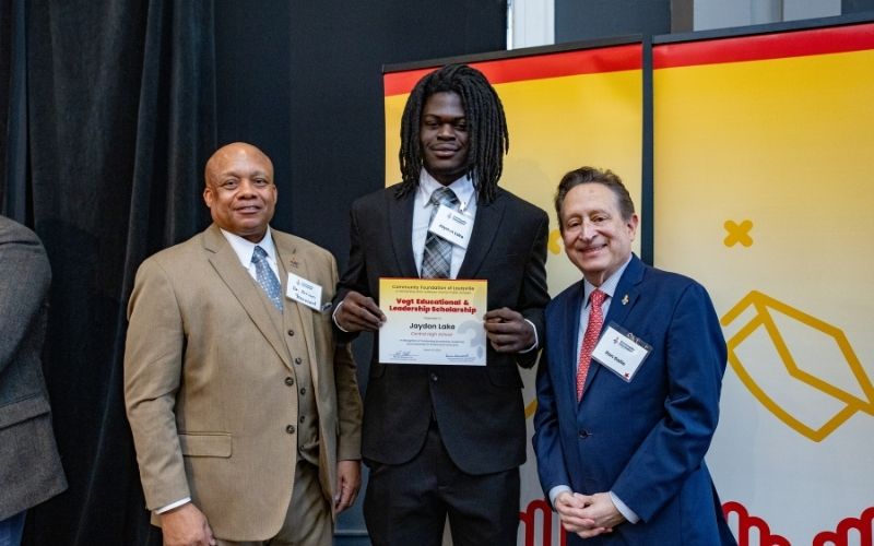 Photo featuring JCPS Superintendent Brian Yearwood, Ph.D., Vogt Scholar Jaydon Lake, and Community Foundation CEO & President, Ron Gallo