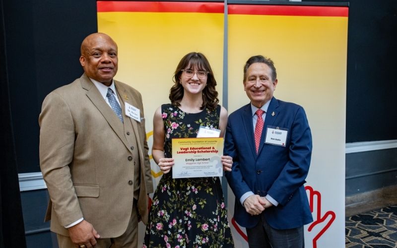 Photo featuring JCPS Superintendent Brian Yearwood, Ph.D., Vogt Scholar Emily Lambert, and Community Foundation CEO & President, Ron Gallo