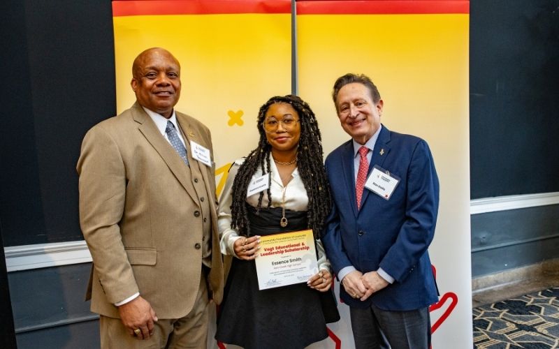 Photo featuring JCPS Superintendent Brian Yearwood, Ph.D., Vogt Scholar Essence Smith, and Community Foundation CEO & President, Ron Gallo