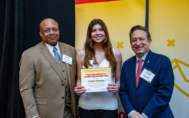 Photo featuring JCPS Superintendent Brian Yearwood, Ph.D., Vogt Scholar Caitlyn Staebler, and Community Foundation CEO & President, Ron Gallo