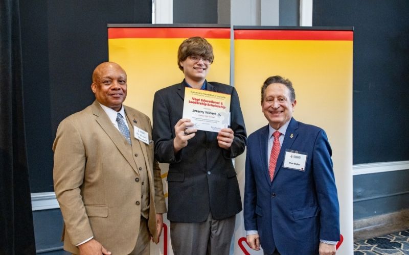 Photo featuring JCPS Superintendent Brian Yearwood, Ph.D., Vogt Scholar Jeremy Wilbert, Jr, and Community Foundation CEO & President, Ron Gallo