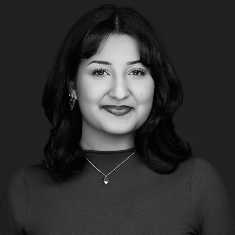 Selina Jadallah, Gifts Associate. Black and white headshot.